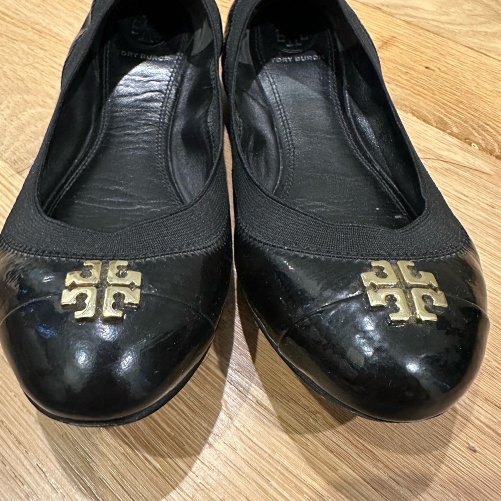Tory Burch size 7w Black and Gold Leather Flats